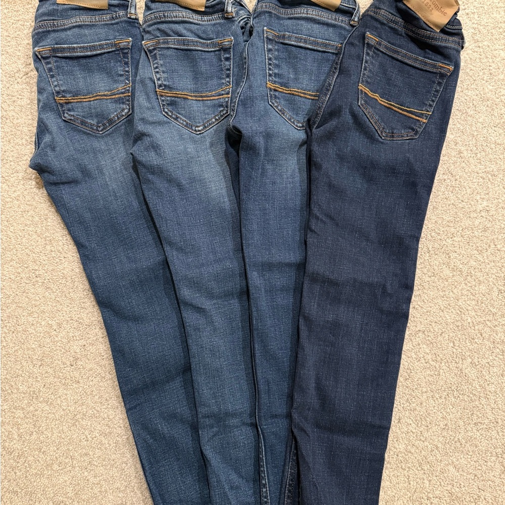 Four pairs of Abercrombie Kids skinny jeans in size 7/8